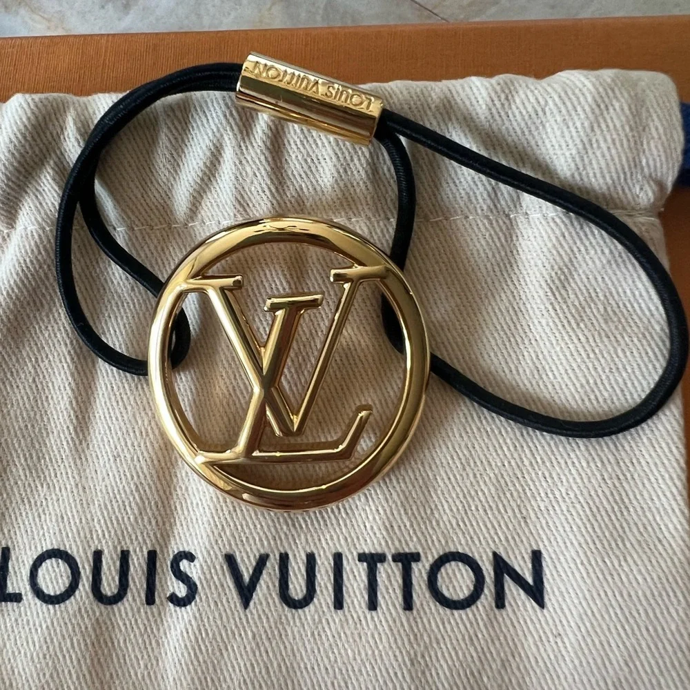 Authentic Louis Vuitton Gold Circle Elastic Hair Tie - Picture 2 of 3